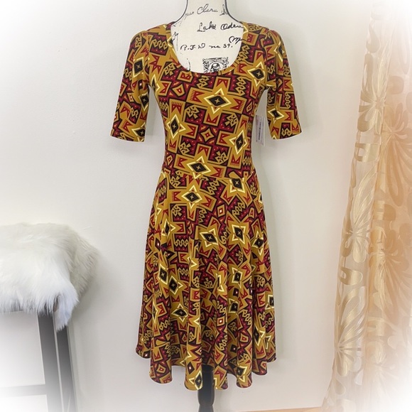 💕NWT Lularoe Nicole Dress Mustard Colored with Fun Star patterns💕 - Picture 4 of 12